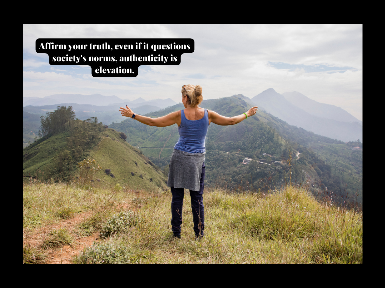 famous female empowerment quote with a woman holding her hands up in the air on a mountain feeling self empowered