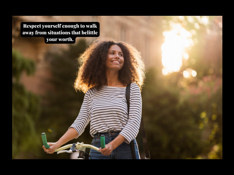 quotes empower women inspiration image with a woman standing beside her bike smiling and looking empowered
