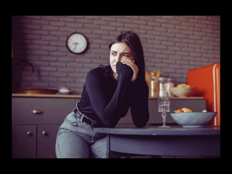 a woman sitting at a table